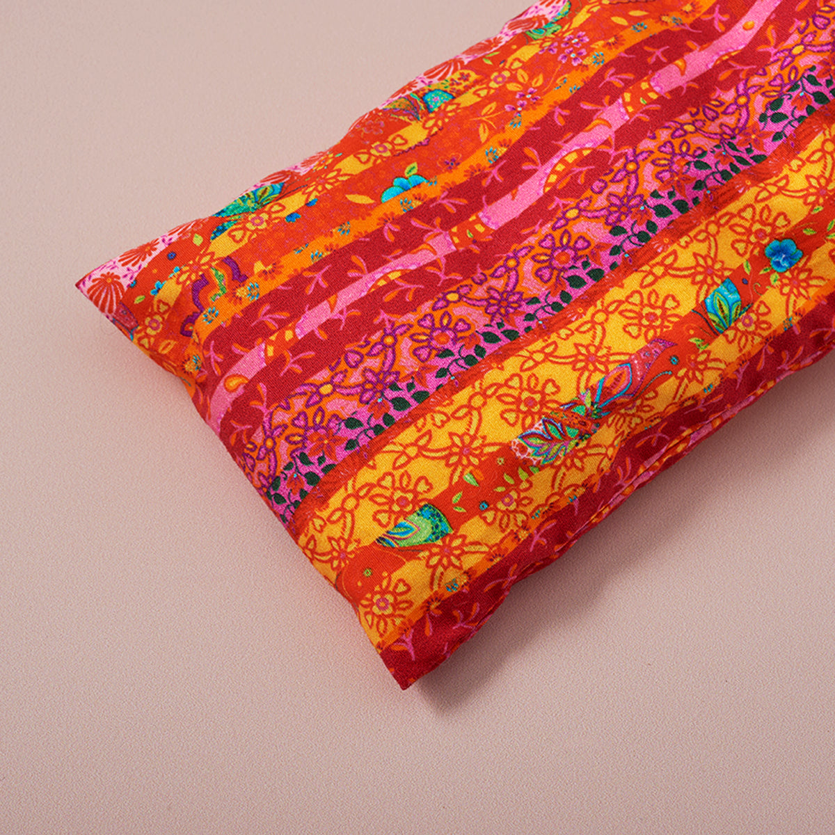 Coussin pour les yeux rayures et fleurs ton chaud india